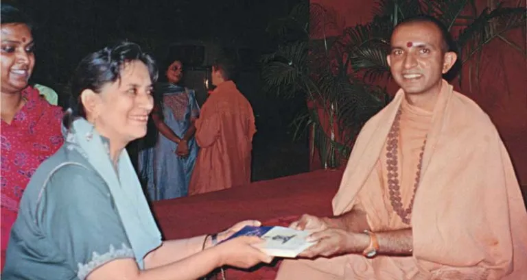 Paramahamsa Swami Niranjanananda Saraswati, President of the Bihar School of Yoga · 2003 · Presenting a copy of my first book